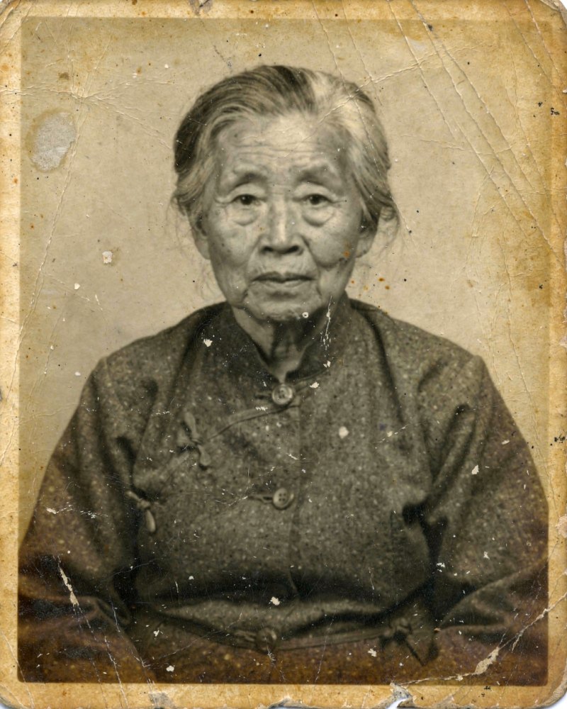Before — faded, scratched old photo